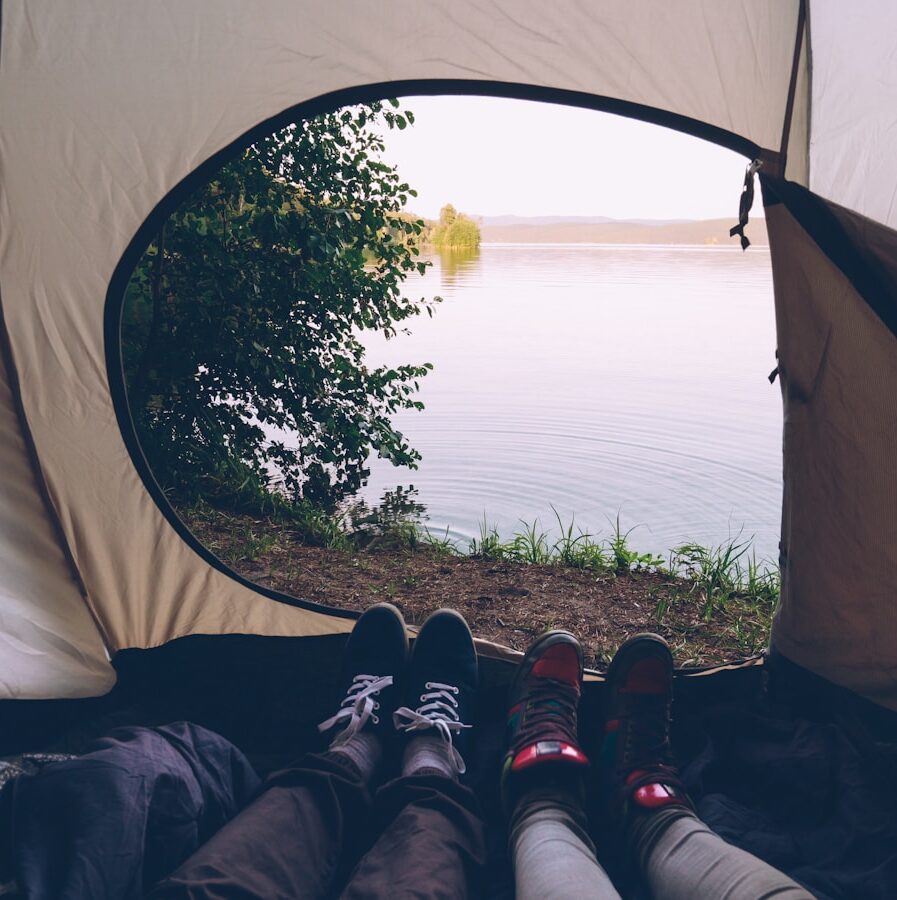 View of a lake from inside a tent